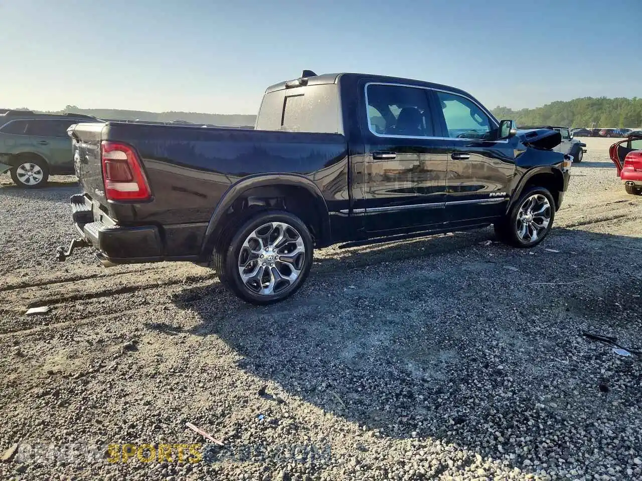 3 Photograph of a damaged car 1C6SRFHM0MN799707 RAM 1500 2021