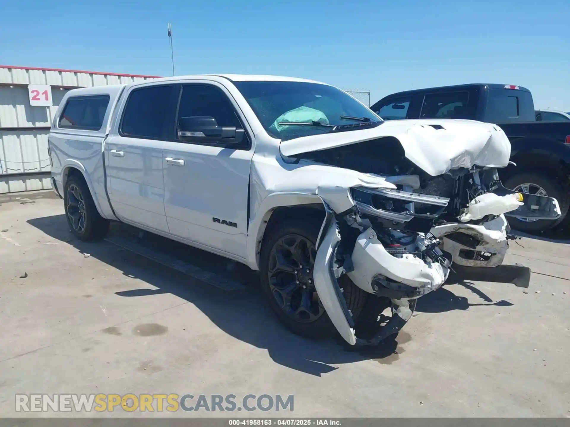 1 Photograph of a damaged car 1C6SRFHM2MN806592 RAM 1500 2021