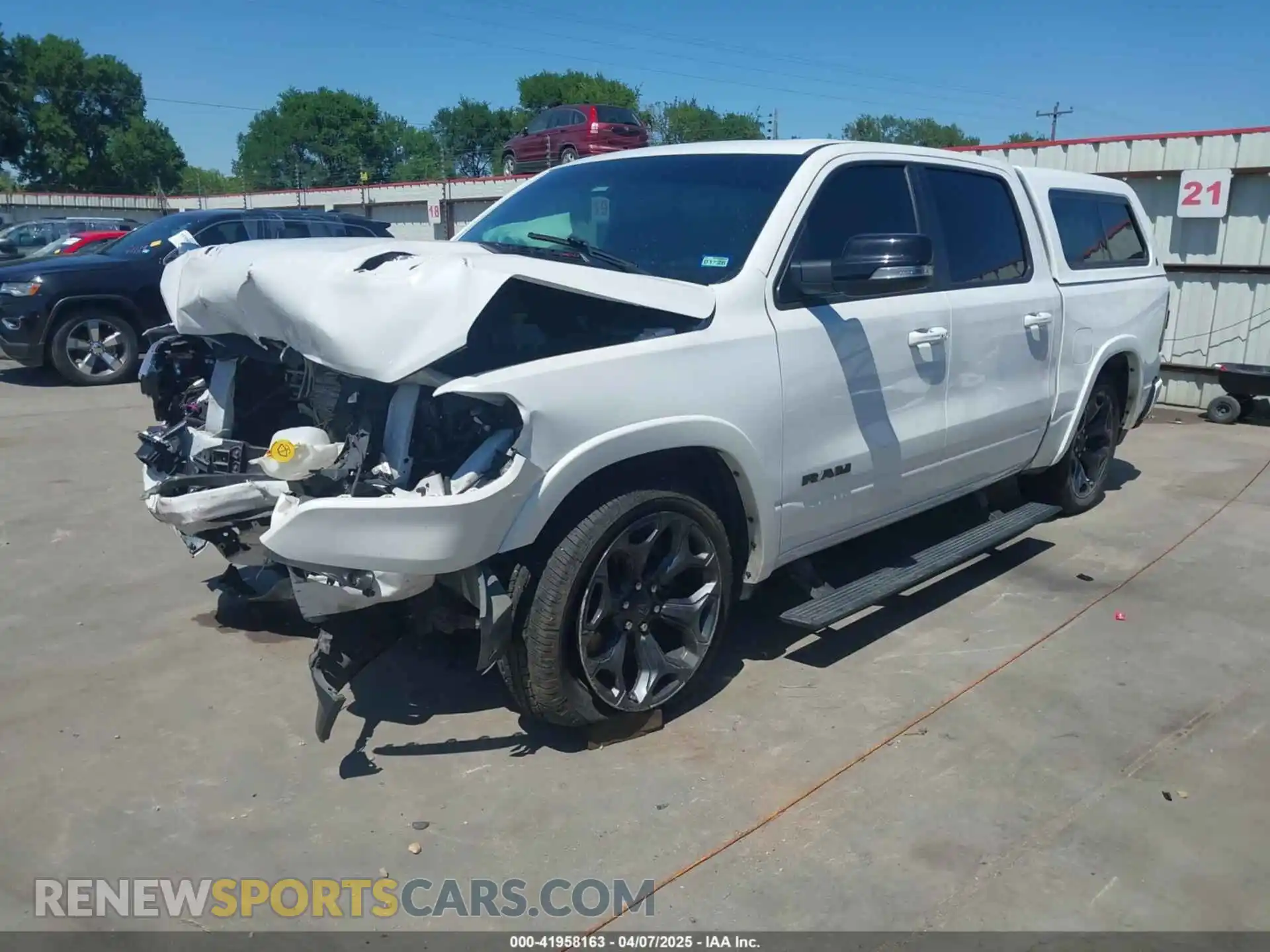 2 Photograph of a damaged car 1C6SRFHM2MN806592 RAM 1500 2021