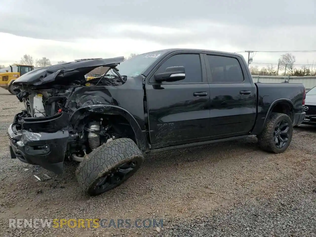 1 Photograph of a damaged car 1C6SRFHM8MN667360 RAM 1500 2021