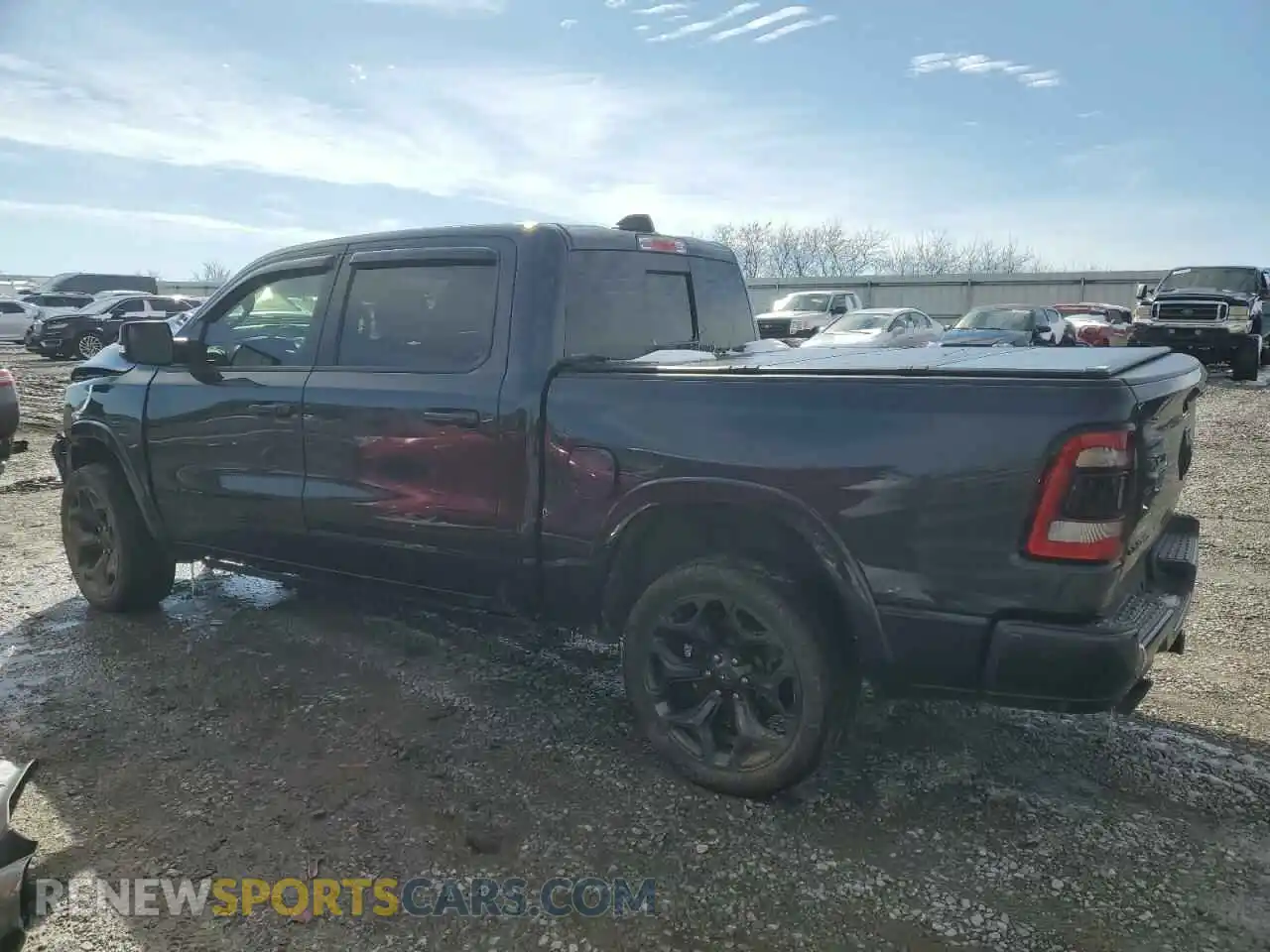 2 Photograph of a damaged car 1C6SRFHMXMN672253 RAM 1500 2021