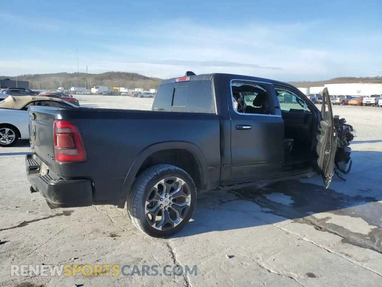 3 Photograph of a damaged car 1C6SRFHMXMN790741 RAM 1500 2021