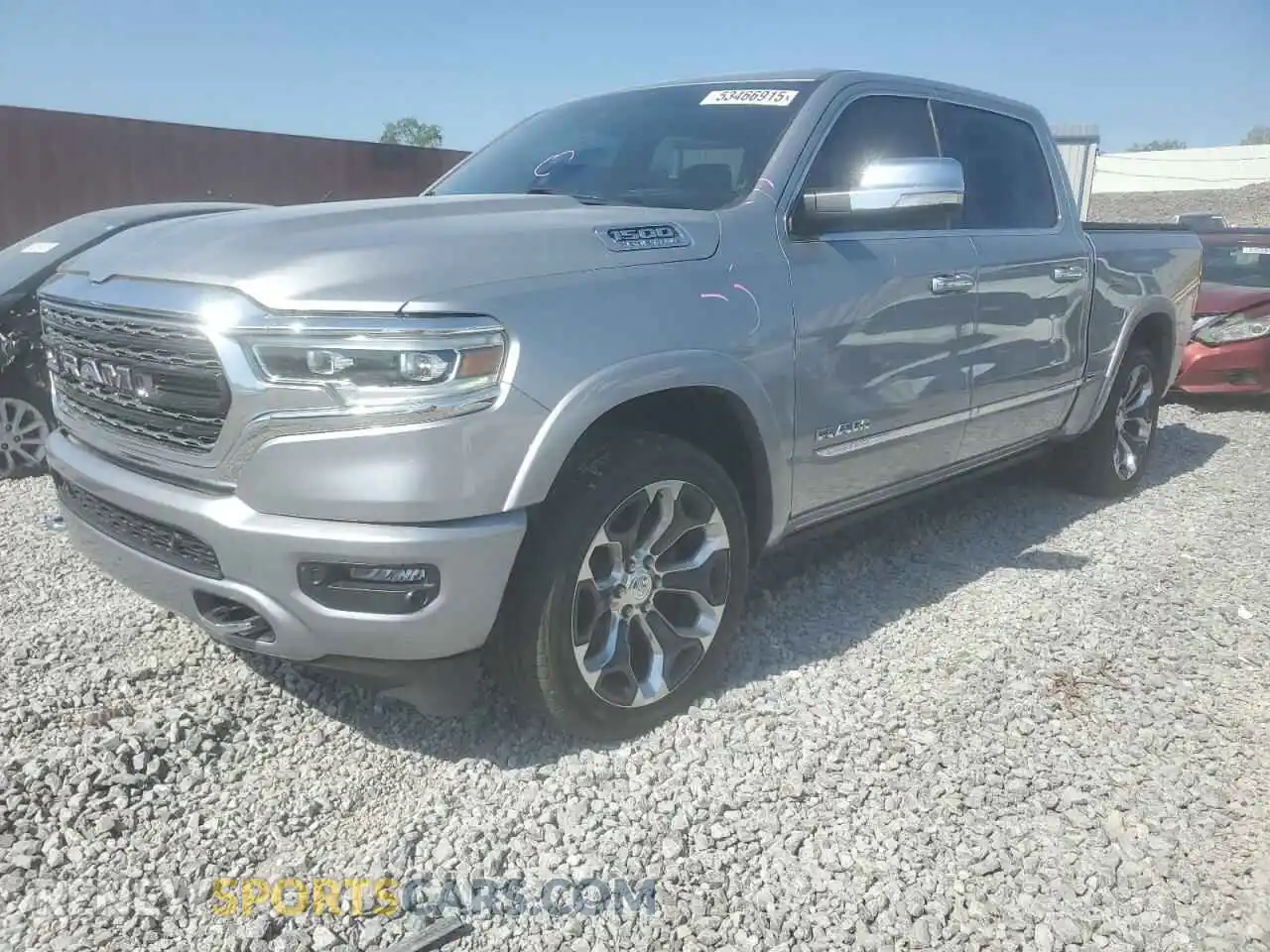 1 Photograph of a damaged car 1C6SRFHT2MN523780 RAM 1500 2021