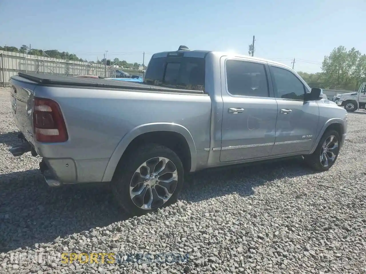 3 Photograph of a damaged car 1C6SRFHT2MN523780 RAM 1500 2021