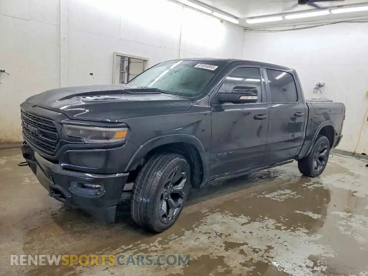 1 Photograph of a damaged car 1C6SRFHT5MN617409 RAM 1500 2021