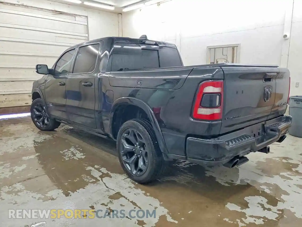 2 Photograph of a damaged car 1C6SRFHT5MN617409 RAM 1500 2021