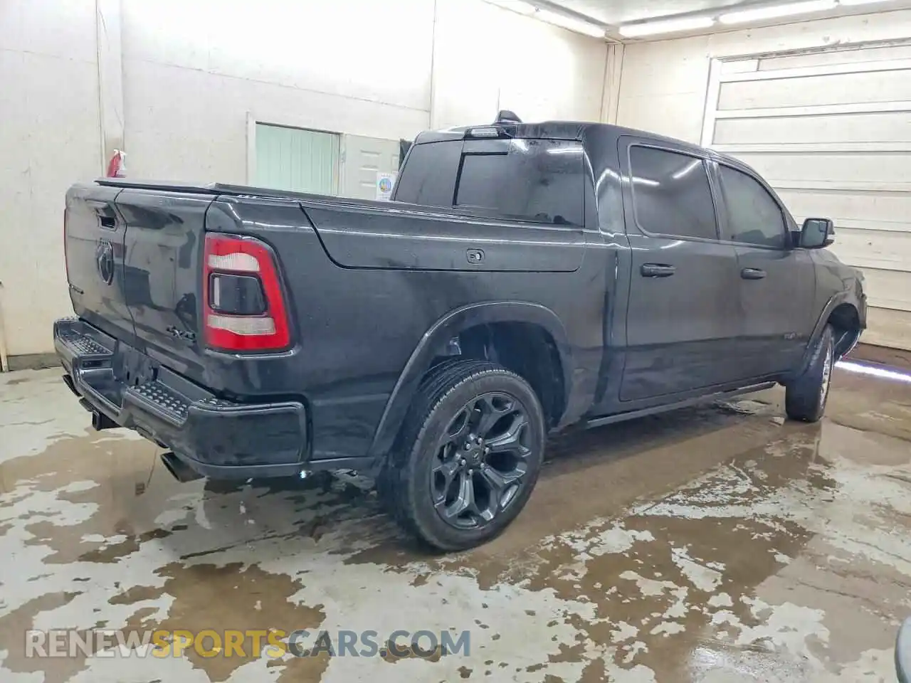 3 Photograph of a damaged car 1C6SRFHT5MN617409 RAM 1500 2021