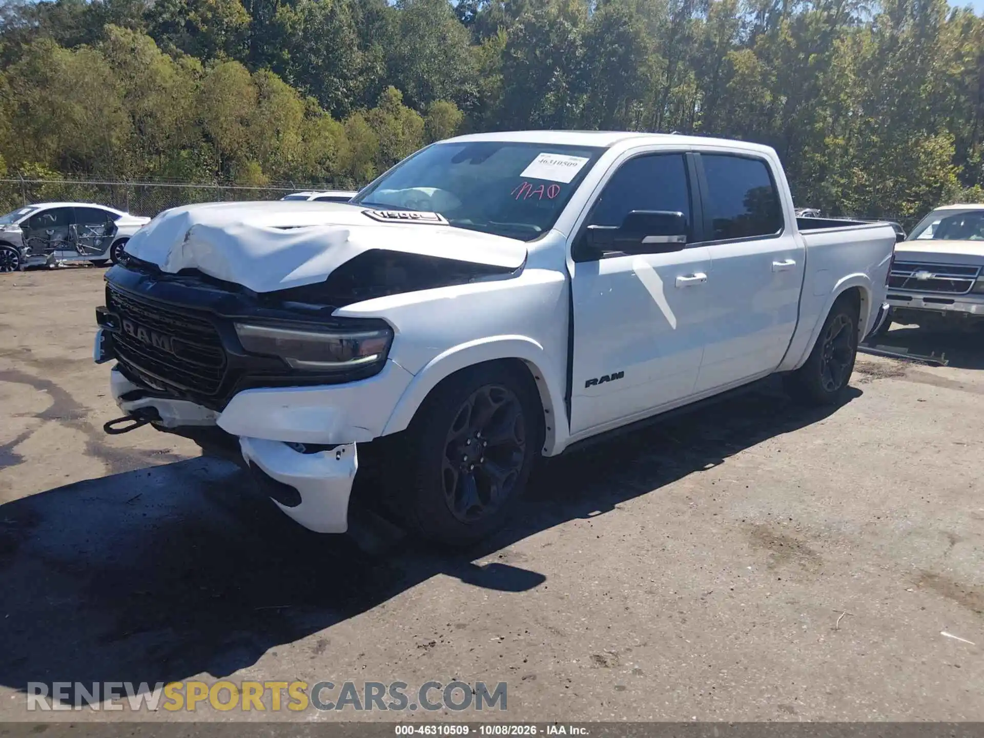 2 Photograph of a damaged car 1C6SRFHT6MN601591 RAM 1500 2021