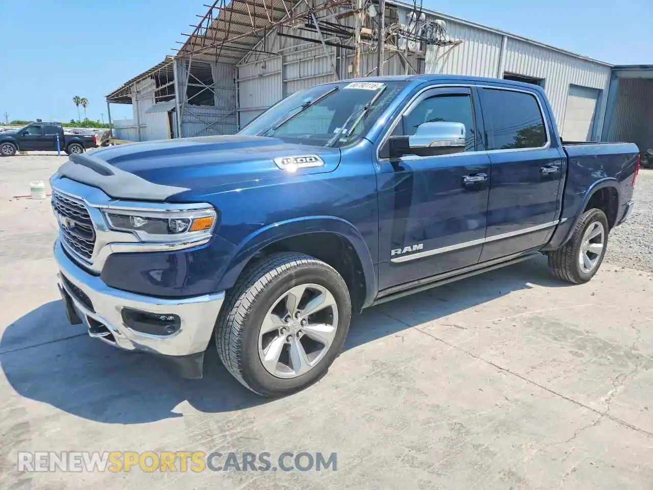 1 Photograph of a damaged car 1C6SRFHT8MN705015 RAM 1500 2021