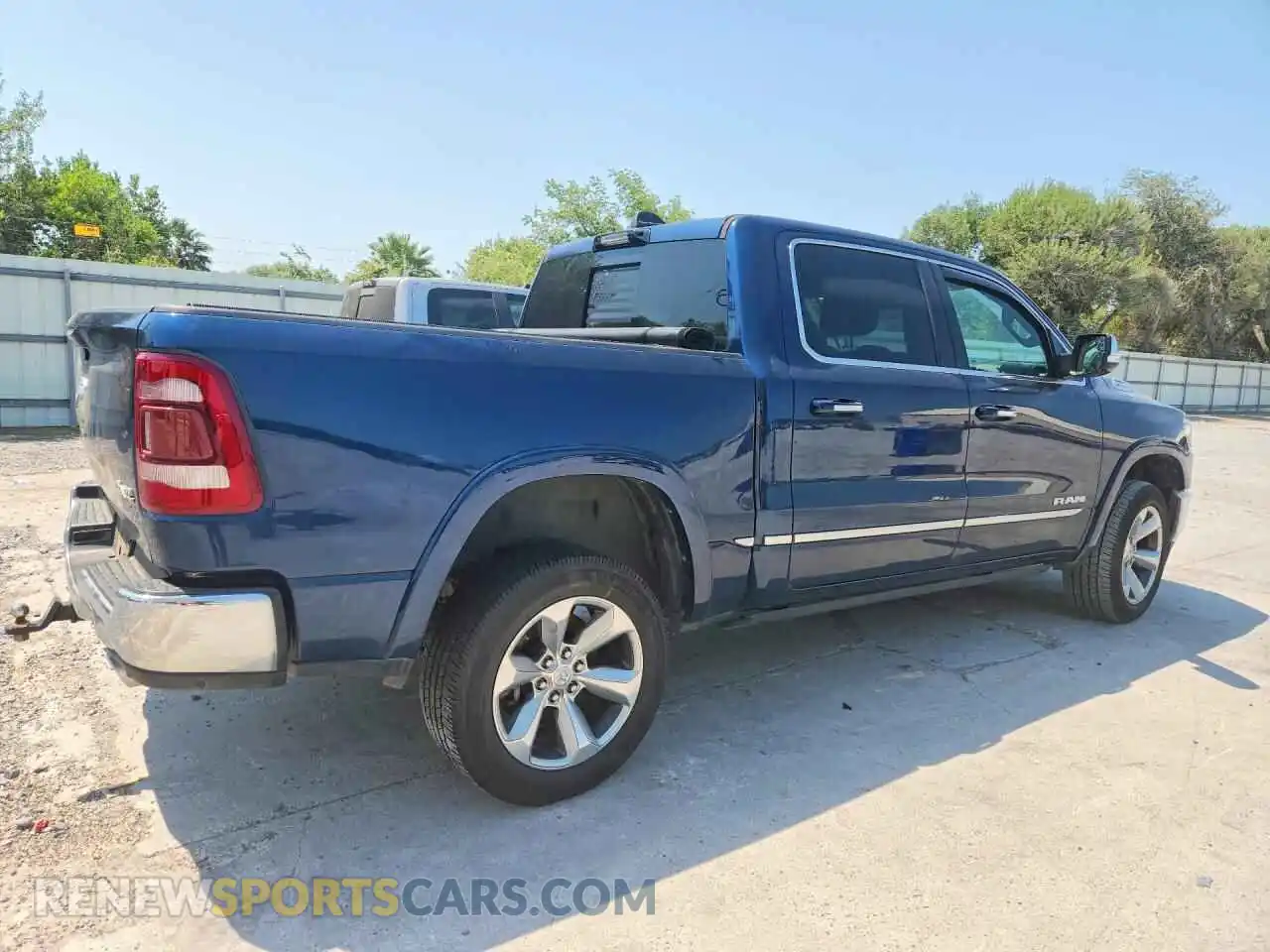 3 Photograph of a damaged car 1C6SRFHT8MN705015 RAM 1500 2021