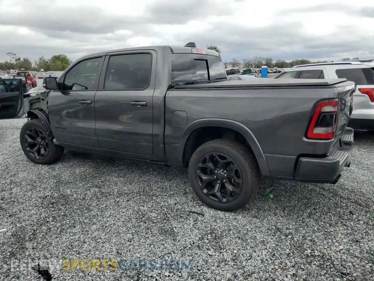 2 Photograph of a damaged car 1C6SRFHT9MN552032 RAM 1500 2021