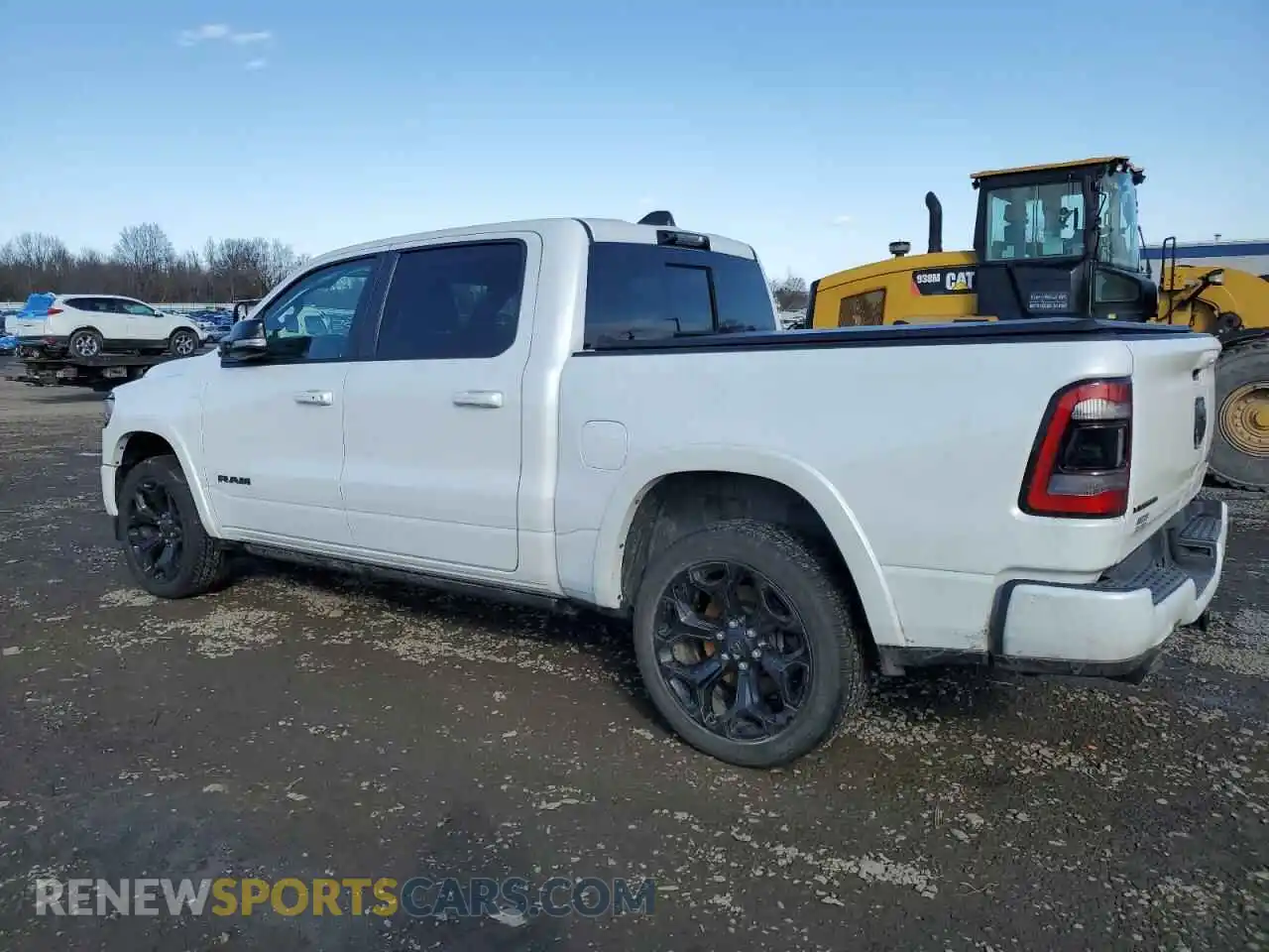 2 Photograph of a damaged car 1C6SRFHT9MN812994 RAM 1500 2021