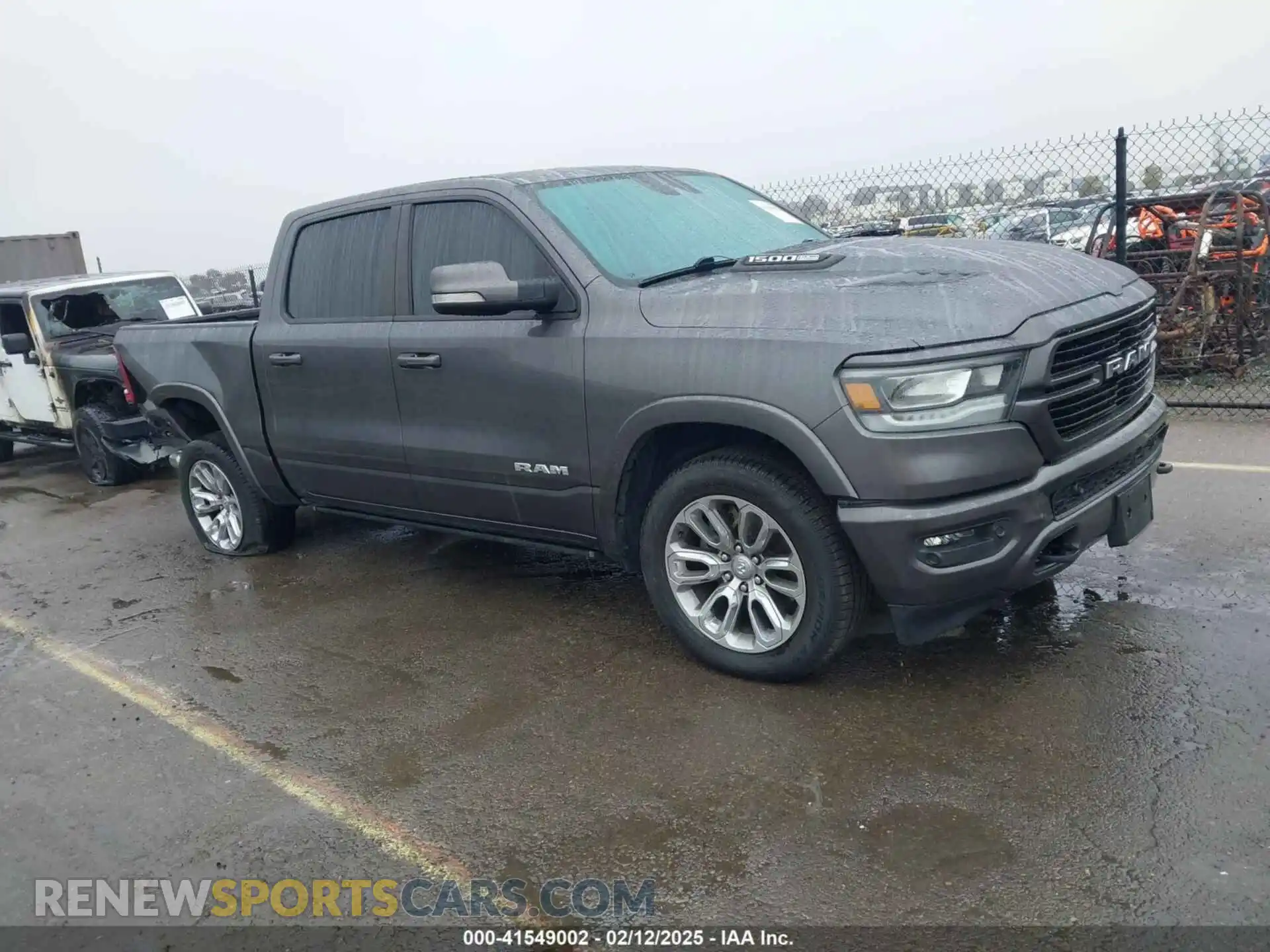 1 Photograph of a damaged car 1C6SRFJT0MN616503 RAM 1500 2021