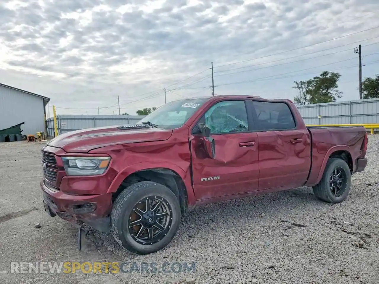1 Photograph of a damaged car 1C6SRFJT0MN621006 RAM 1500 2021