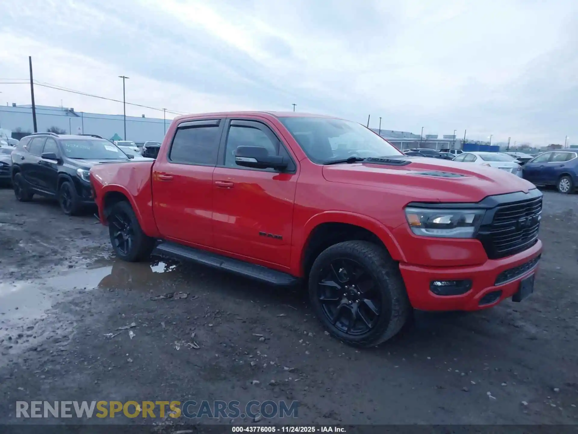 1 Photograph of a damaged car 1C6SRFJT0MN657522 RAM 1500 2021