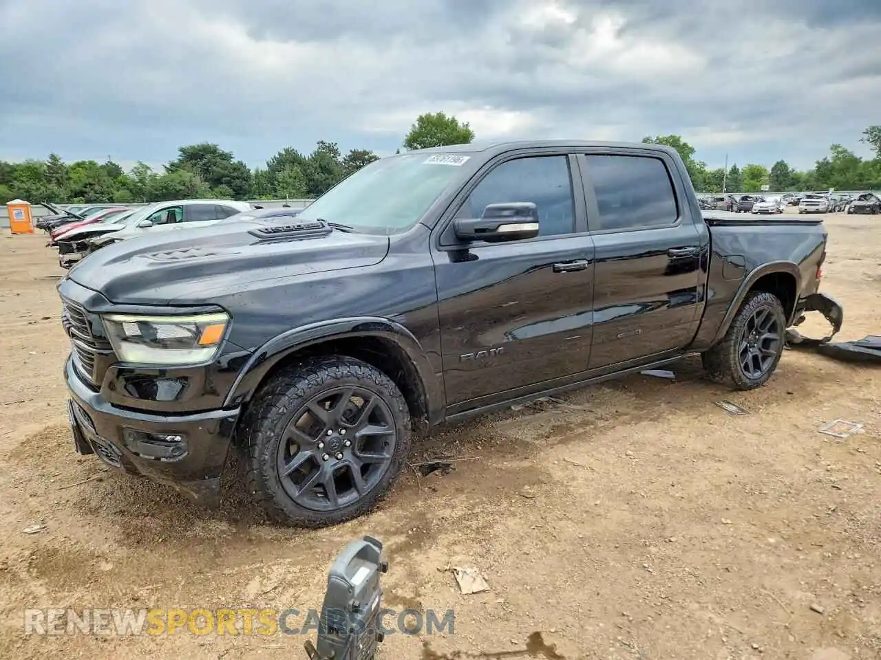 1 Photograph of a damaged car 1C6SRFJT1MN509265 RAM 1500 2021