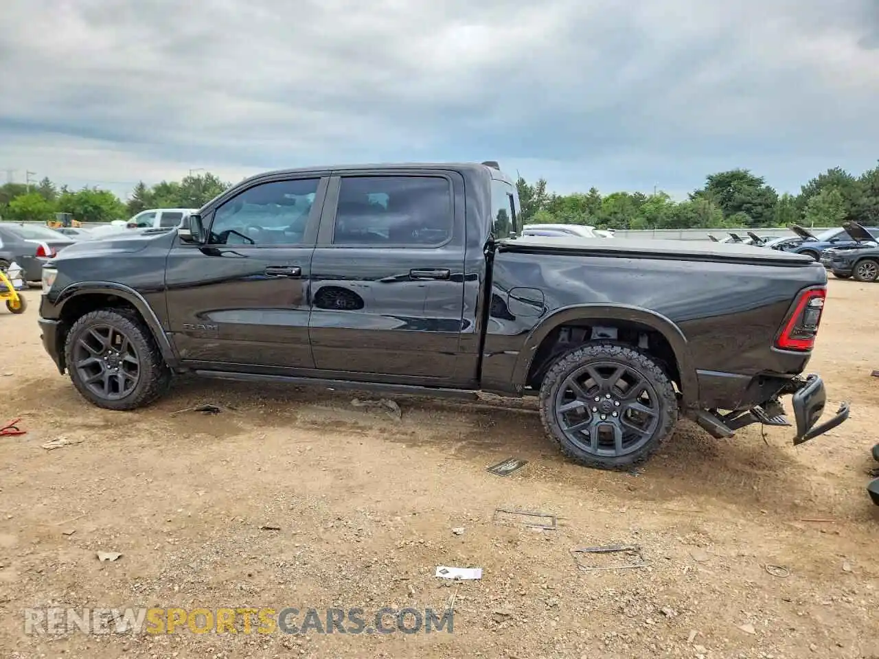 2 Photograph of a damaged car 1C6SRFJT1MN509265 RAM 1500 2021