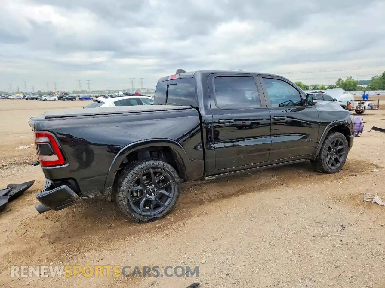 3 Photograph of a damaged car 1C6SRFJT1MN509265 RAM 1500 2021