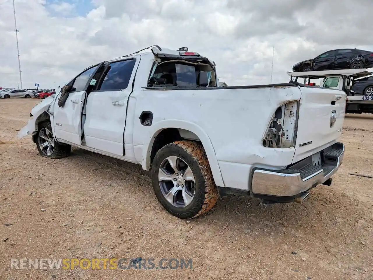 2 Photograph of a damaged car 1C6SRFJT1MN538300 RAM 1500 2021
