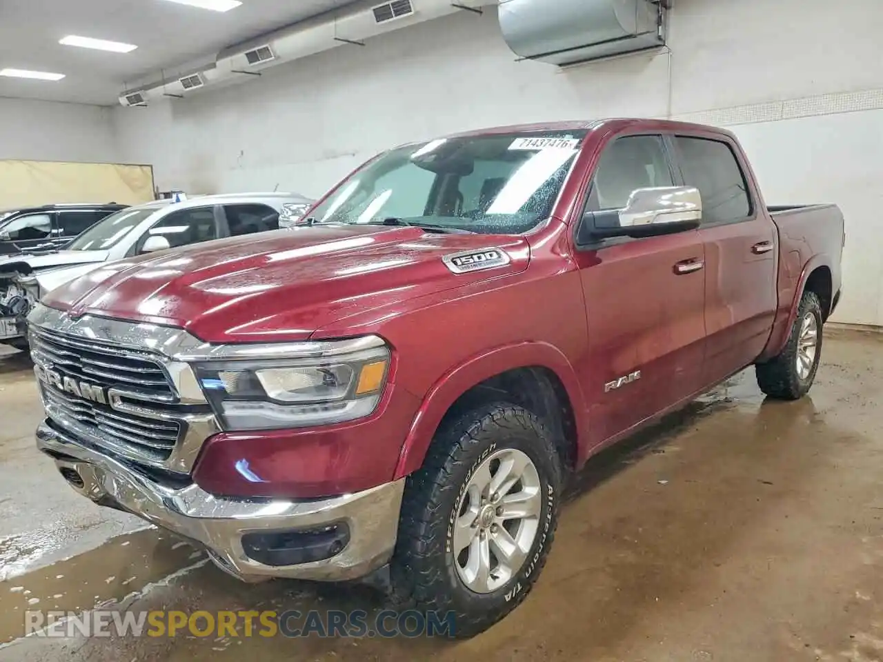 1 Photograph of a damaged car 1C6SRFJT1MN660185 RAM 1500 2021