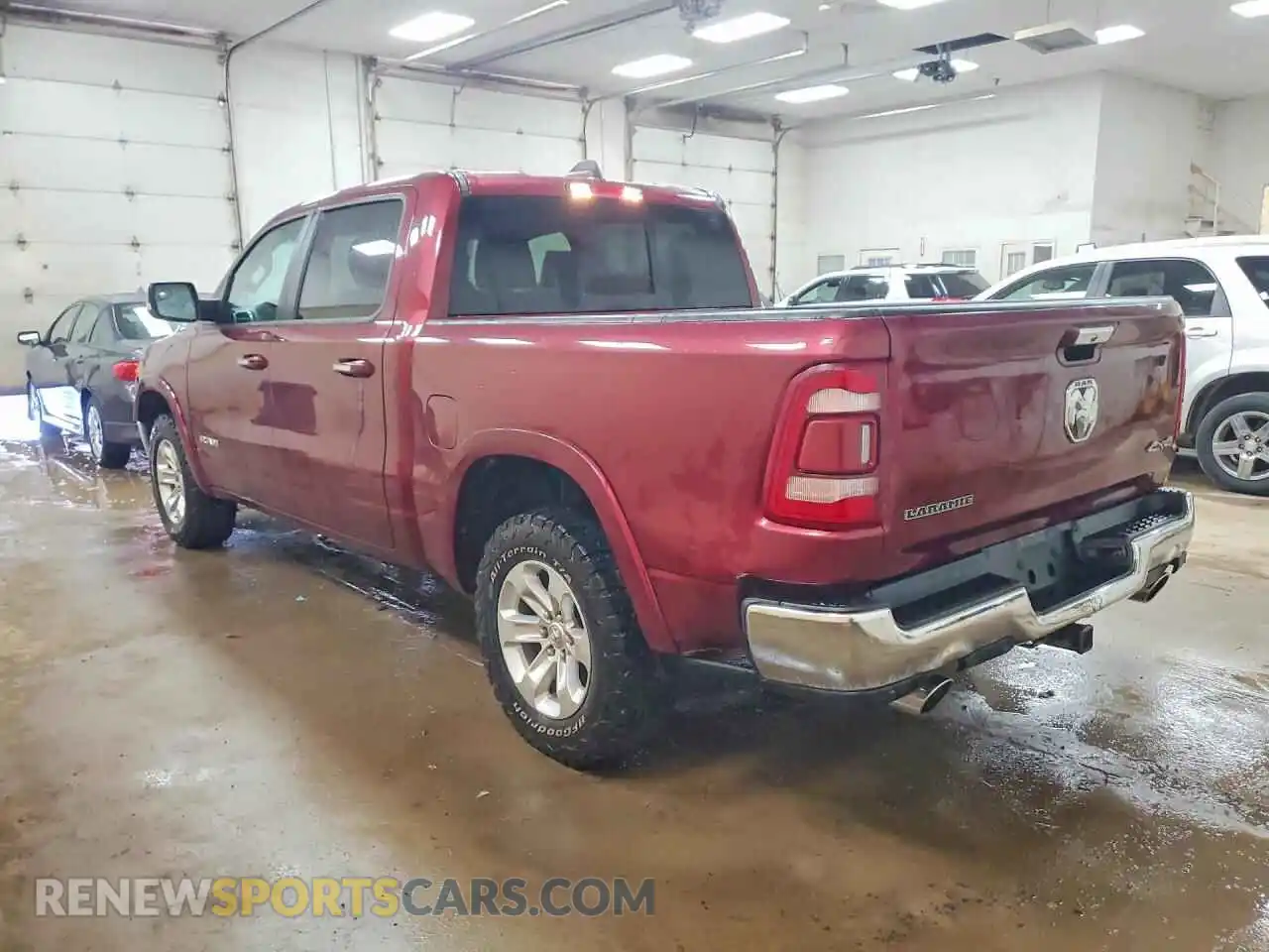 2 Photograph of a damaged car 1C6SRFJT1MN660185 RAM 1500 2021
