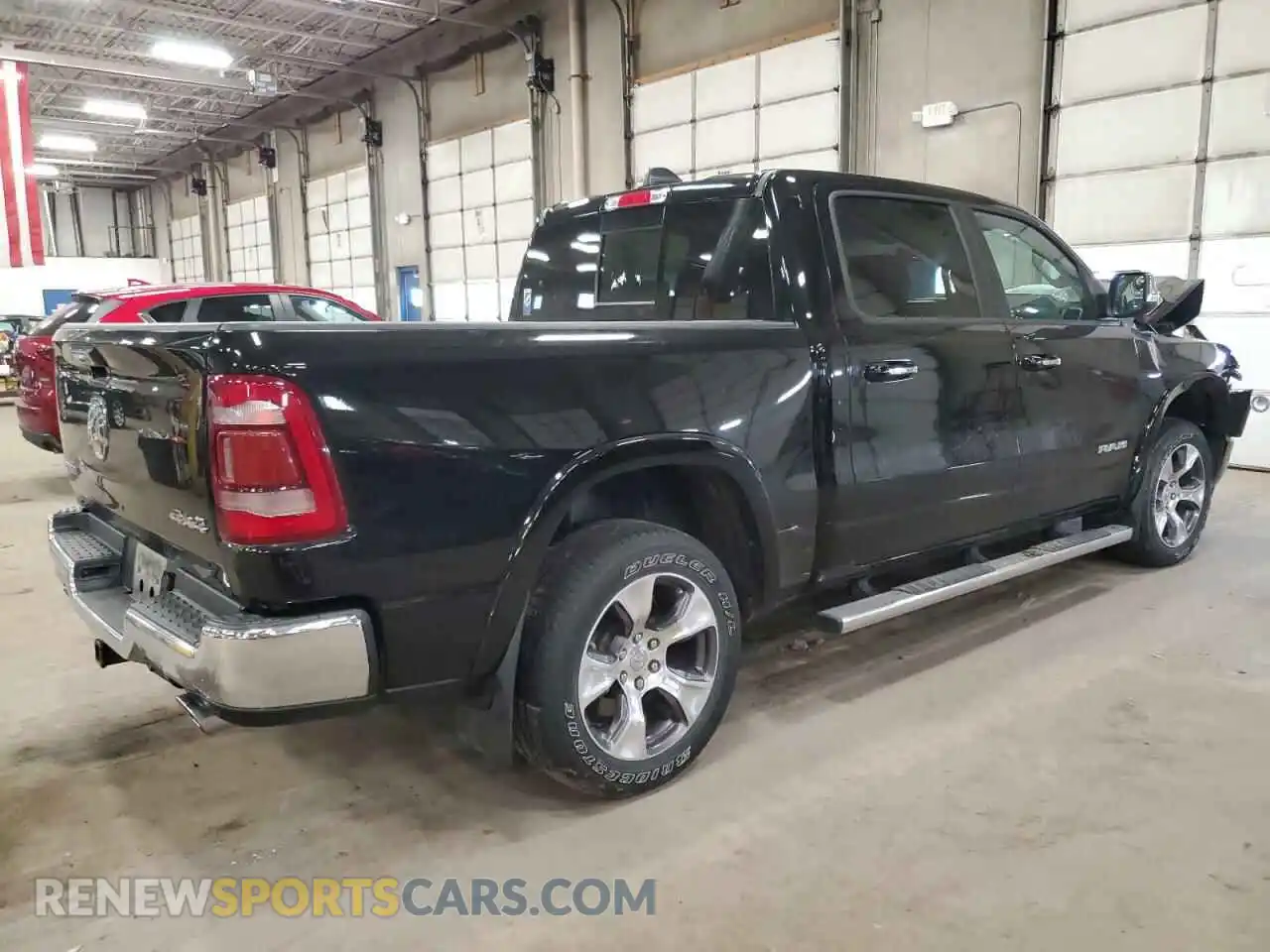3 Photograph of a damaged car 1C6SRFJT1MN678783 RAM 1500 2021