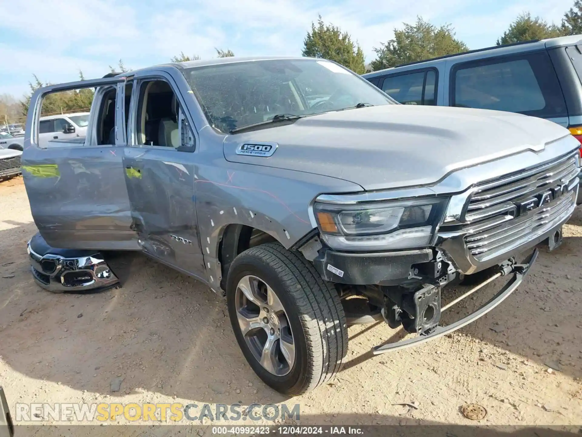 1 Photograph of a damaged car 1C6SRFJT1MN702466 RAM 1500 2021