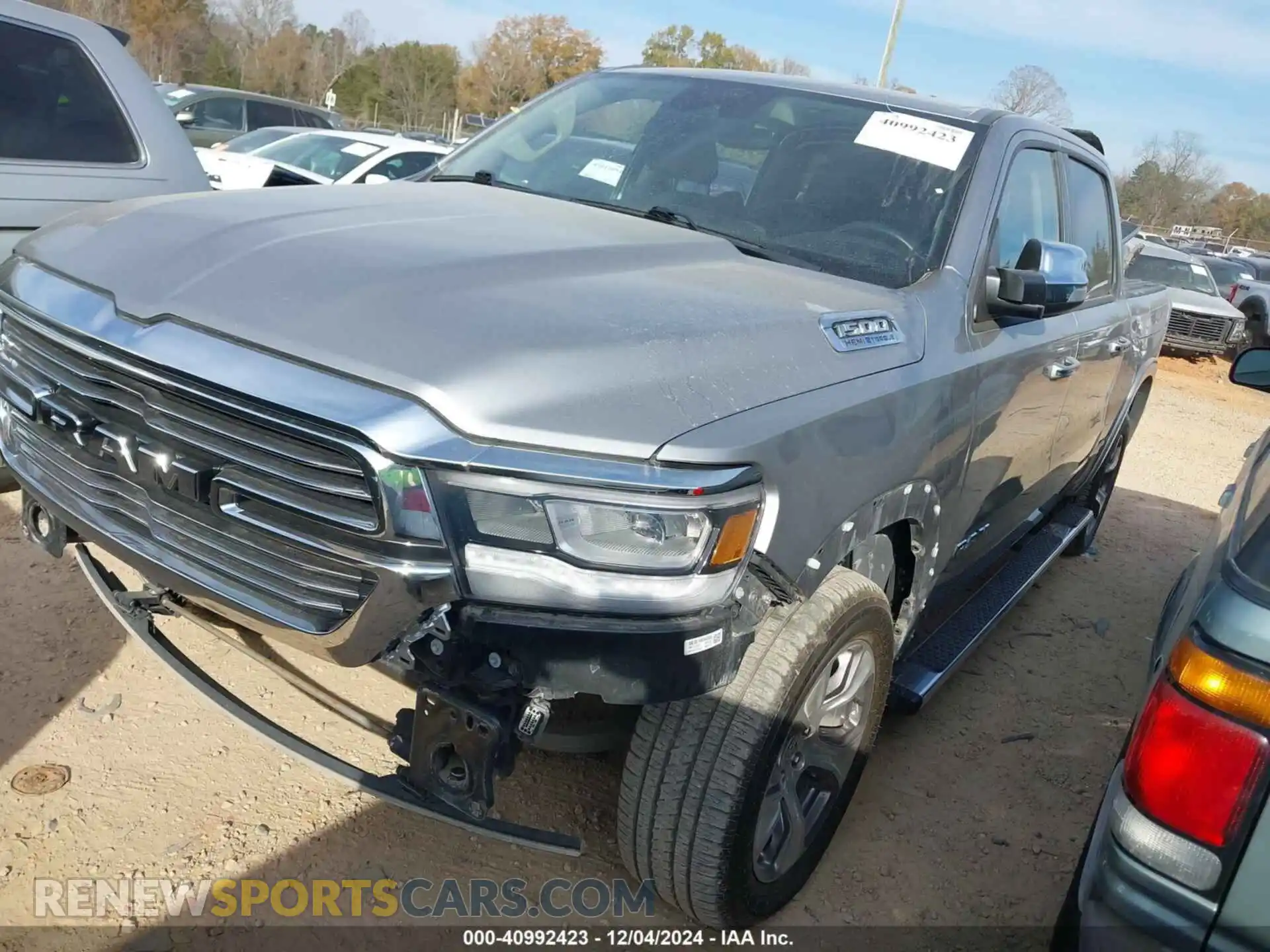 2 Photograph of a damaged car 1C6SRFJT1MN702466 RAM 1500 2021