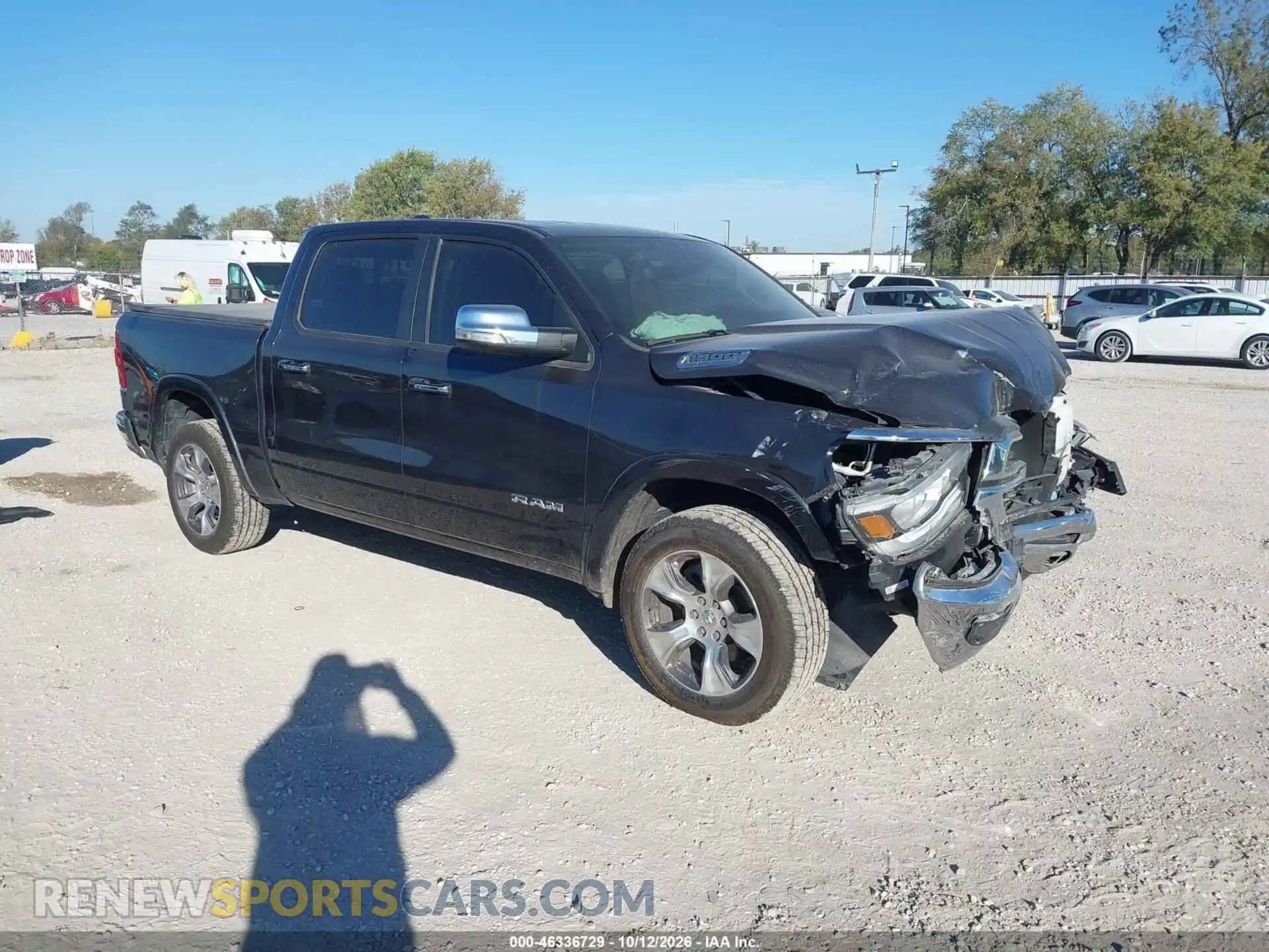 1 Photograph of a damaged car 1C6SRFJT1MN739498 RAM 1500 2021