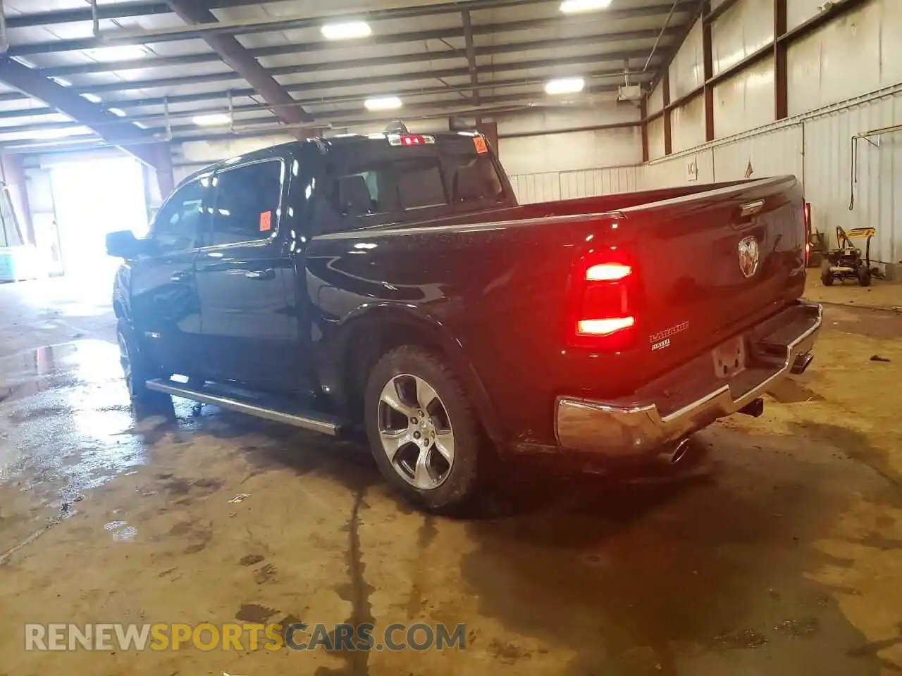 2 Photograph of a damaged car 1C6SRFJT1MN789978 RAM 1500 2021