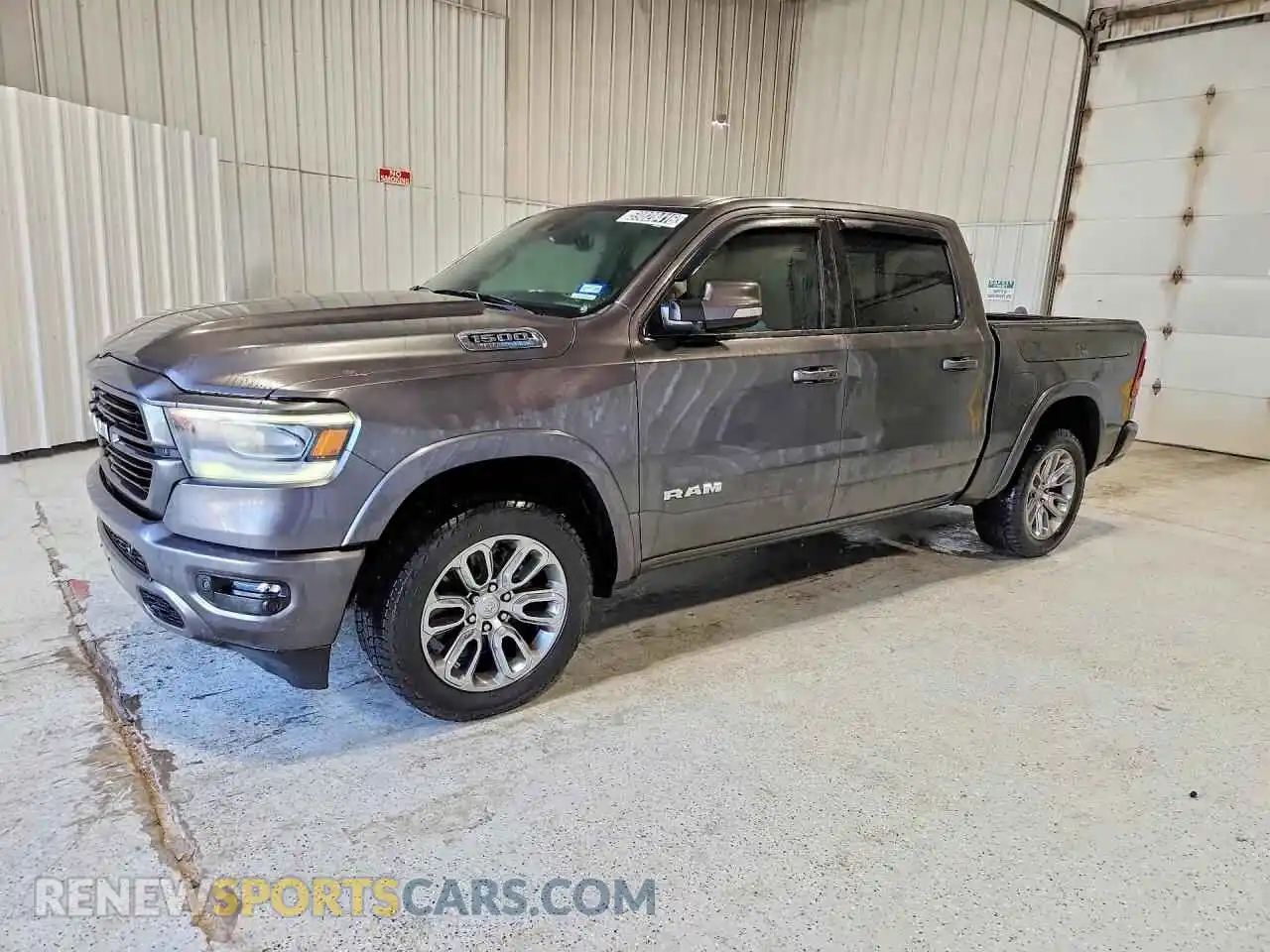 1 Photograph of a damaged car 1C6SRFJT1MN806424 RAM 1500 2021