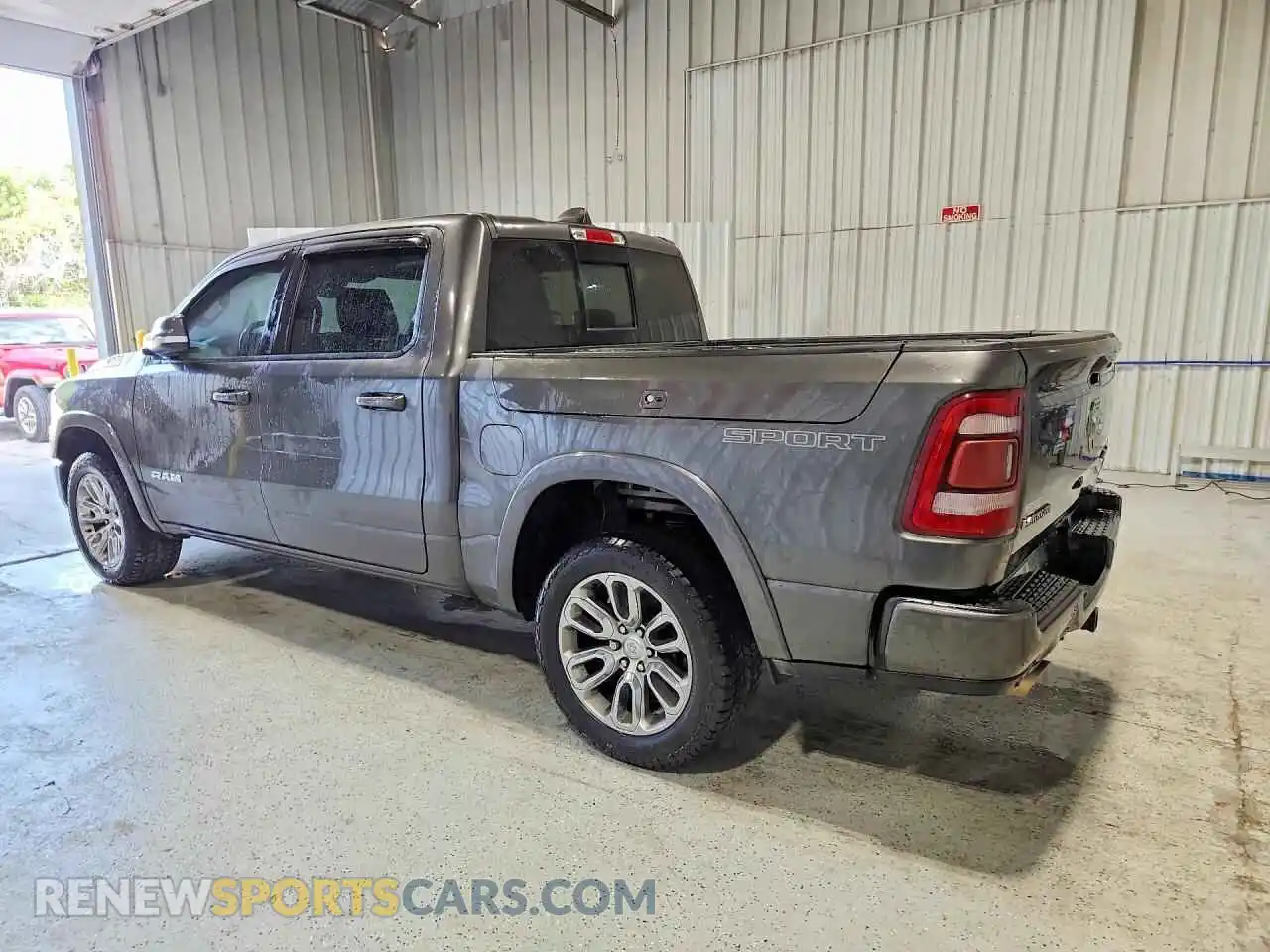 2 Photograph of a damaged car 1C6SRFJT1MN806424 RAM 1500 2021