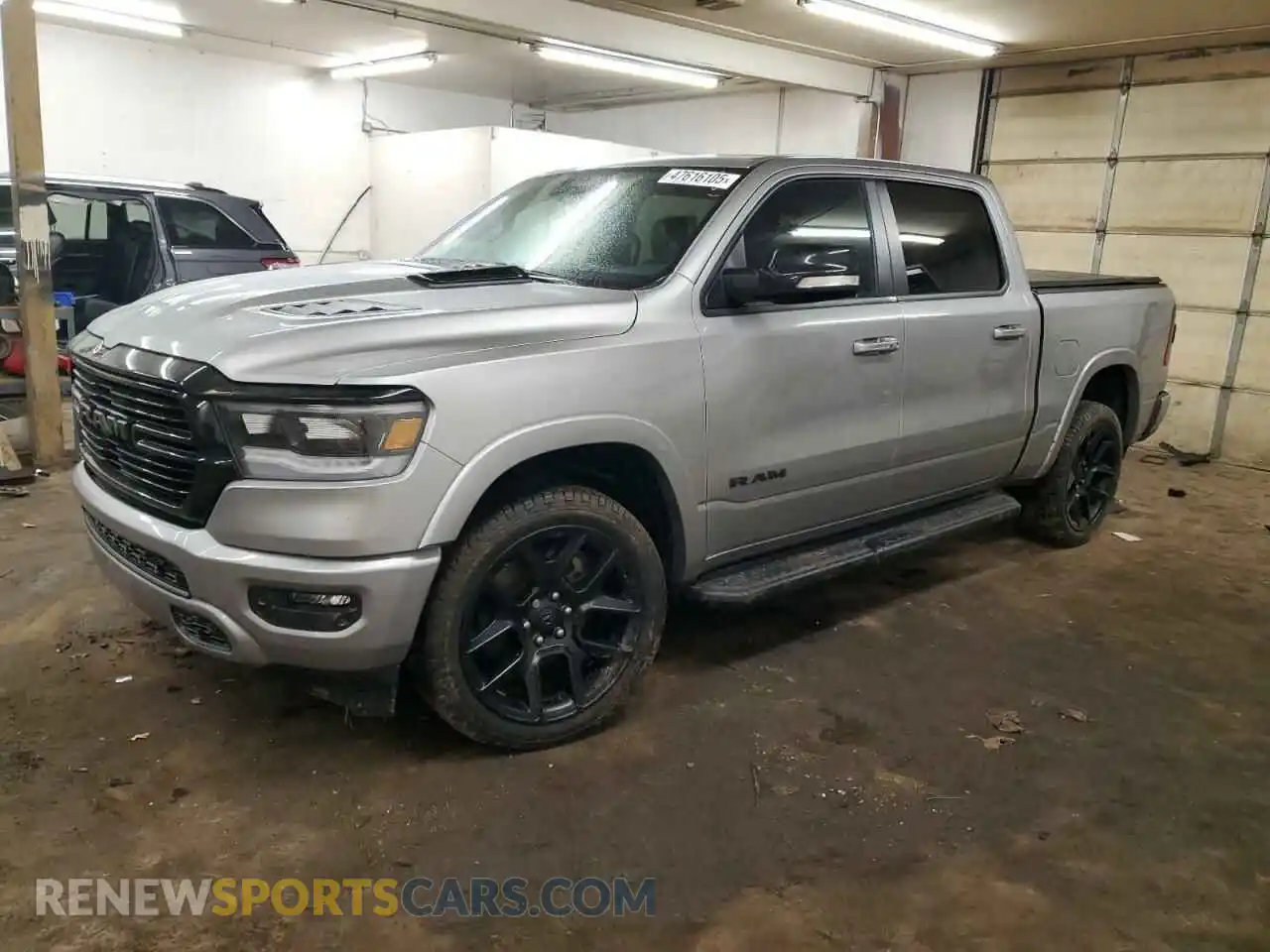 1 Photograph of a damaged car 1C6SRFJT2MN539665 RAM 1500 2021
