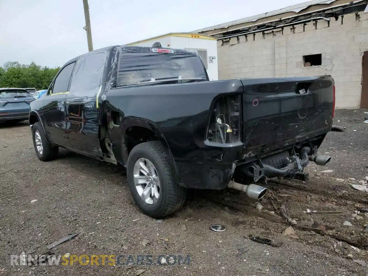 2 Photograph of a damaged car 1C6SRFJT2MN557664 RAM 1500 2021