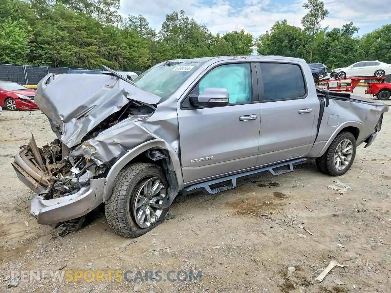 1 Photograph of a damaged car 1C6SRFJT2MN679859 RAM 1500 2021