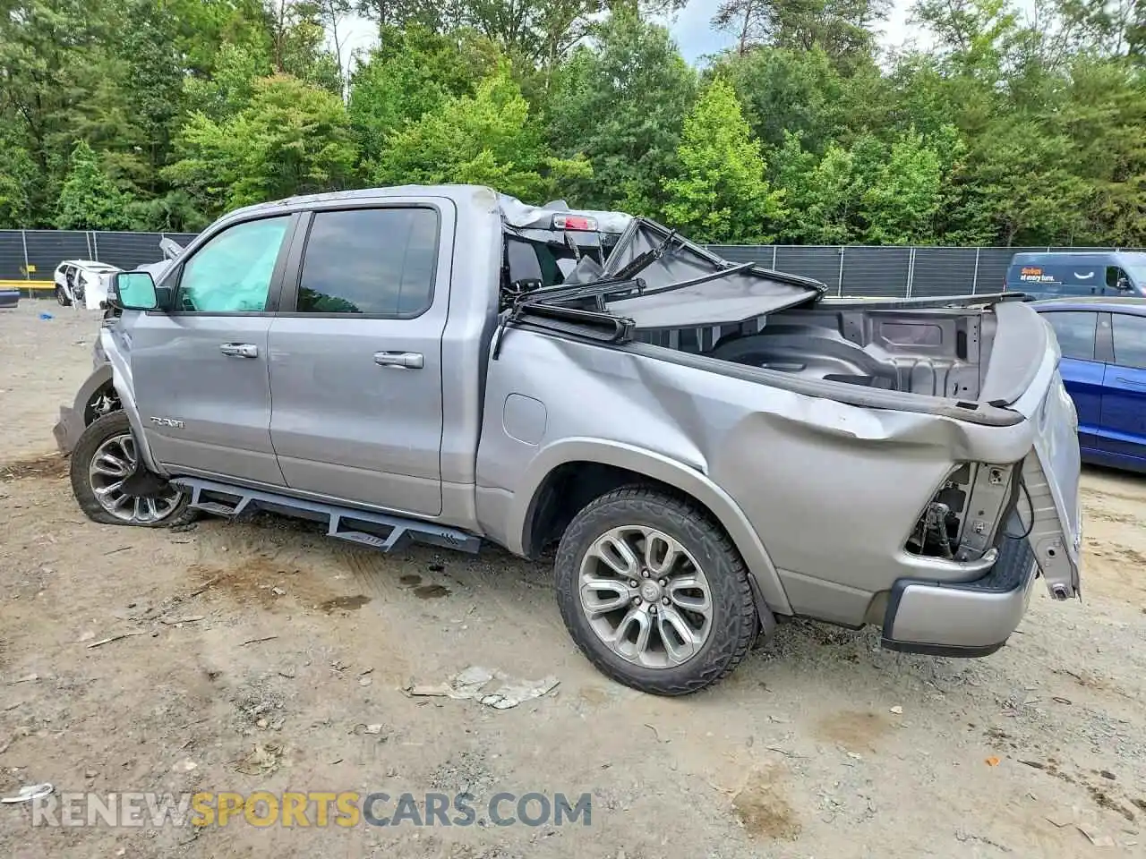 2 Photograph of a damaged car 1C6SRFJT2MN679859 RAM 1500 2021