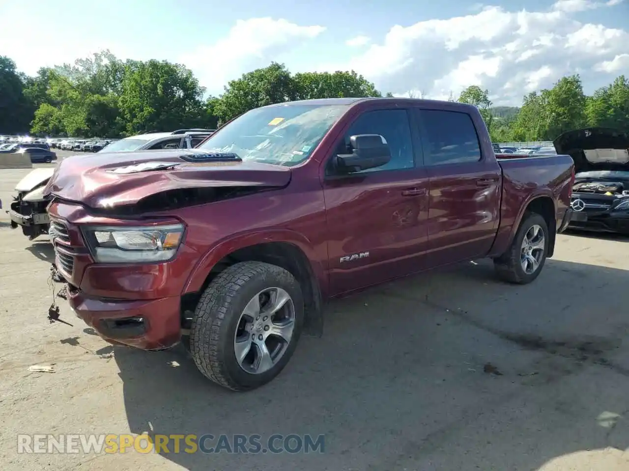 1 Photograph of a damaged car 1C6SRFJT3MN565644 RAM 1500 2021