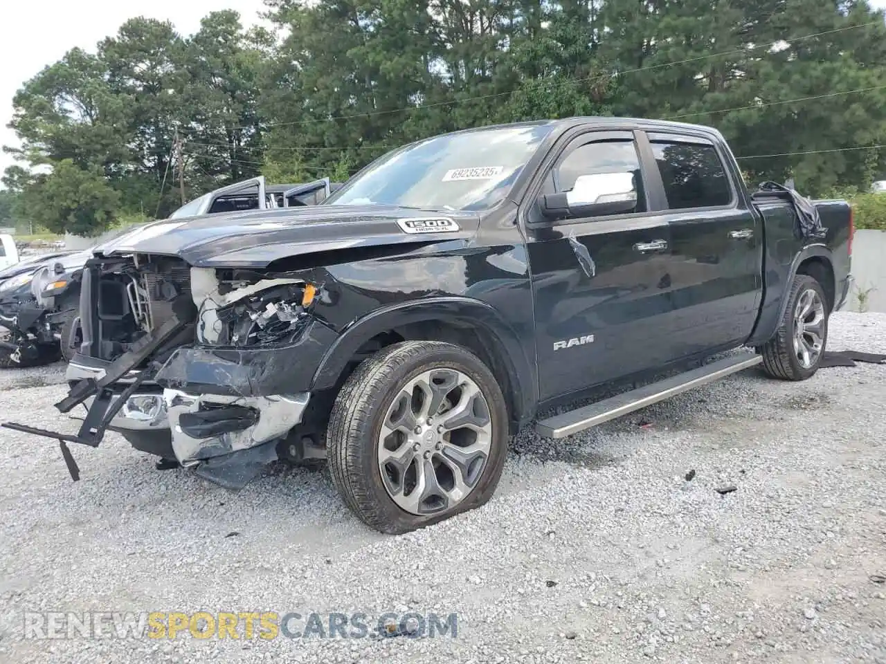 1 Photograph of a damaged car 1C6SRFJT3MN718913 RAM 1500 2021
