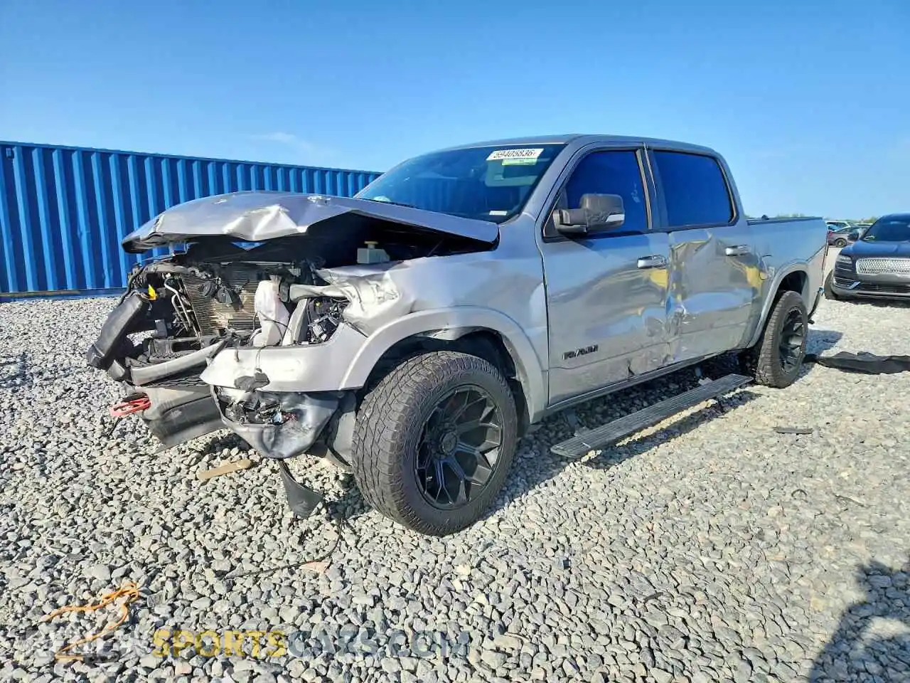 1 Photograph of a damaged car 1C6SRFJT4MN550666 RAM 1500 2021
