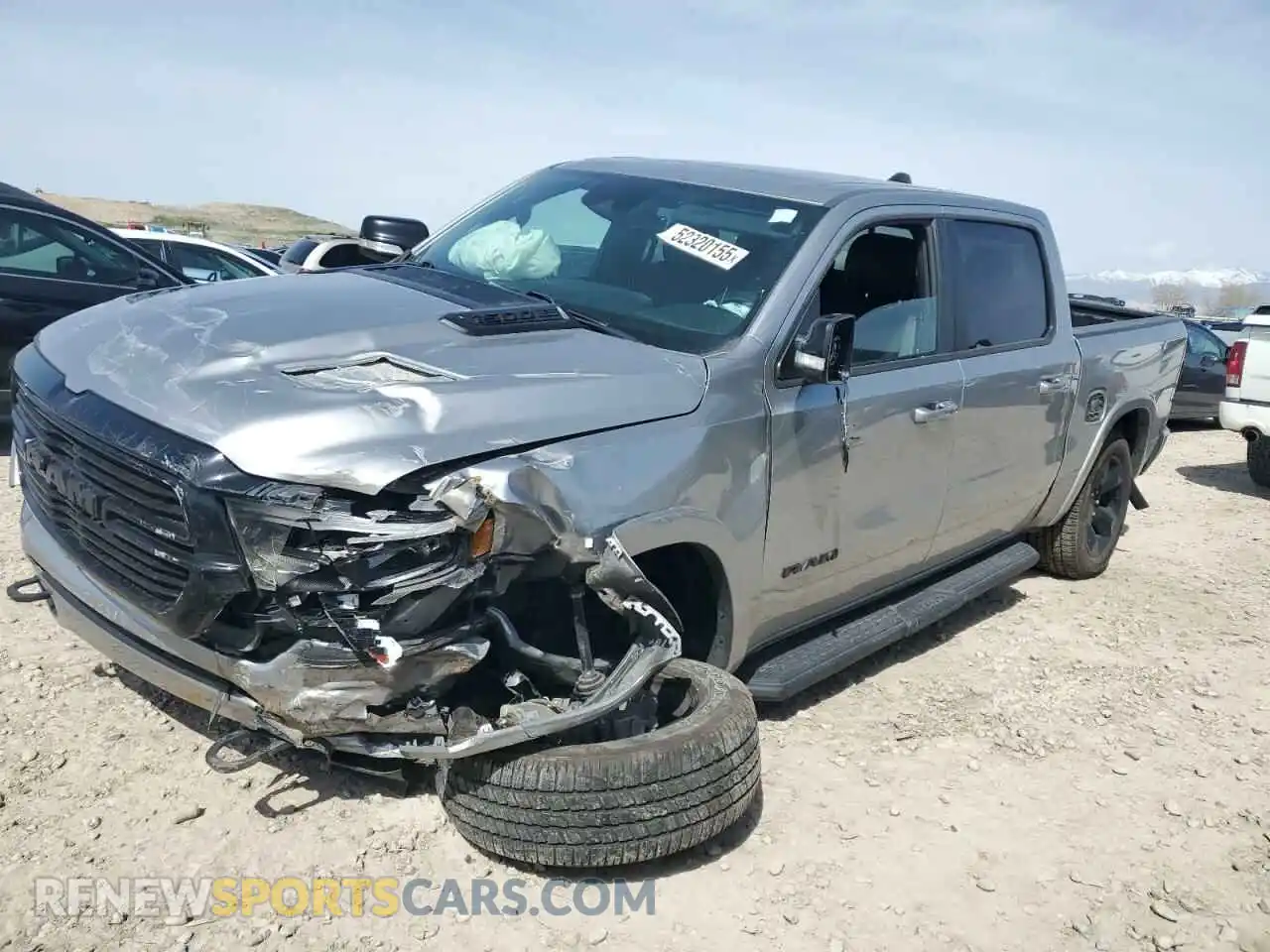 1 Photograph of a damaged car 1C6SRFJT4MN627861 RAM 1500 2021