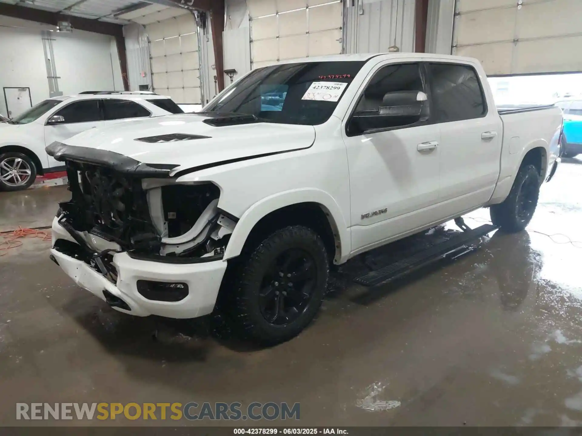 2 Photograph of a damaged car 1C6SRFJT4MN652789 RAM 1500 2021