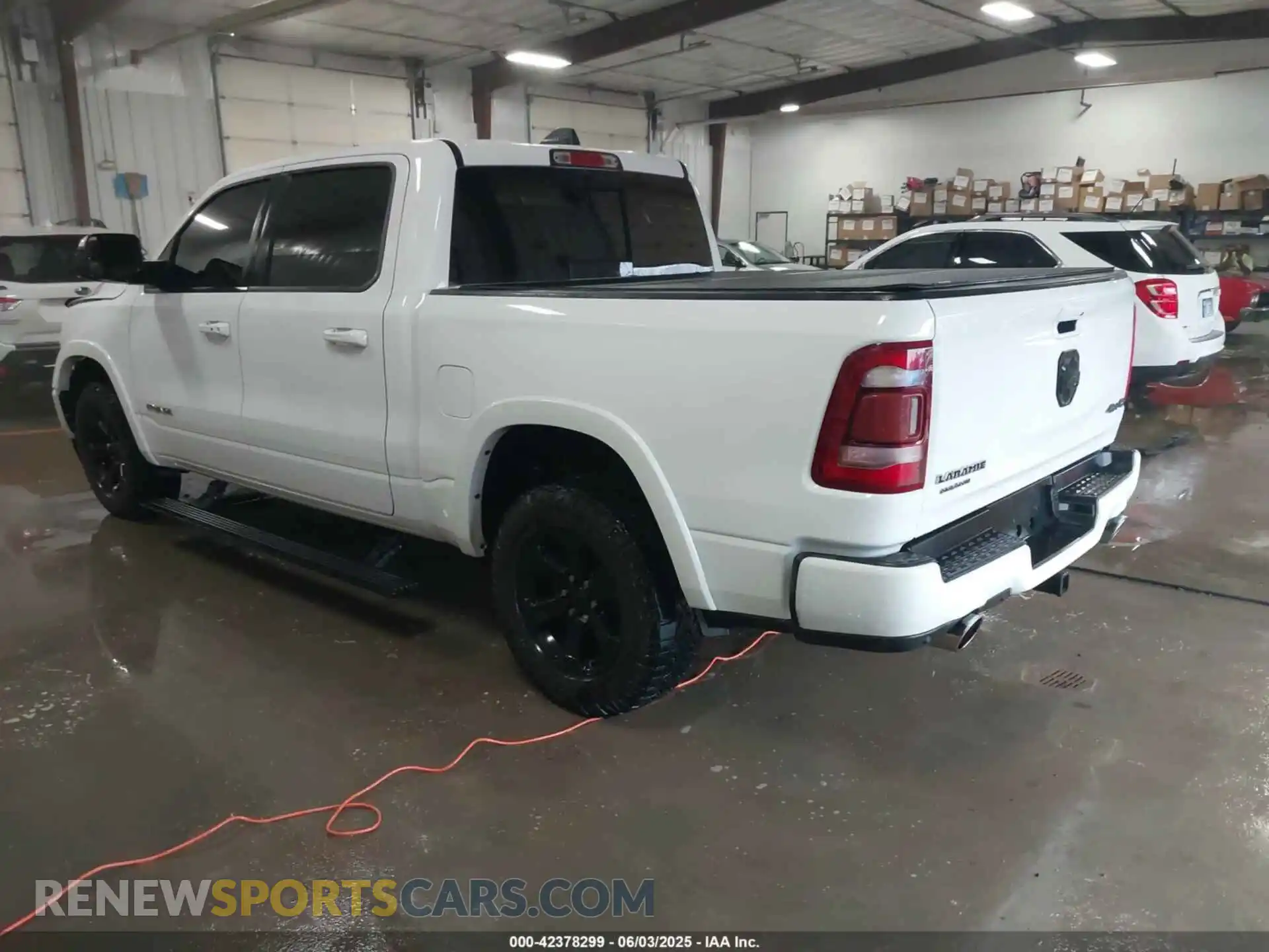 3 Photograph of a damaged car 1C6SRFJT4MN652789 RAM 1500 2021