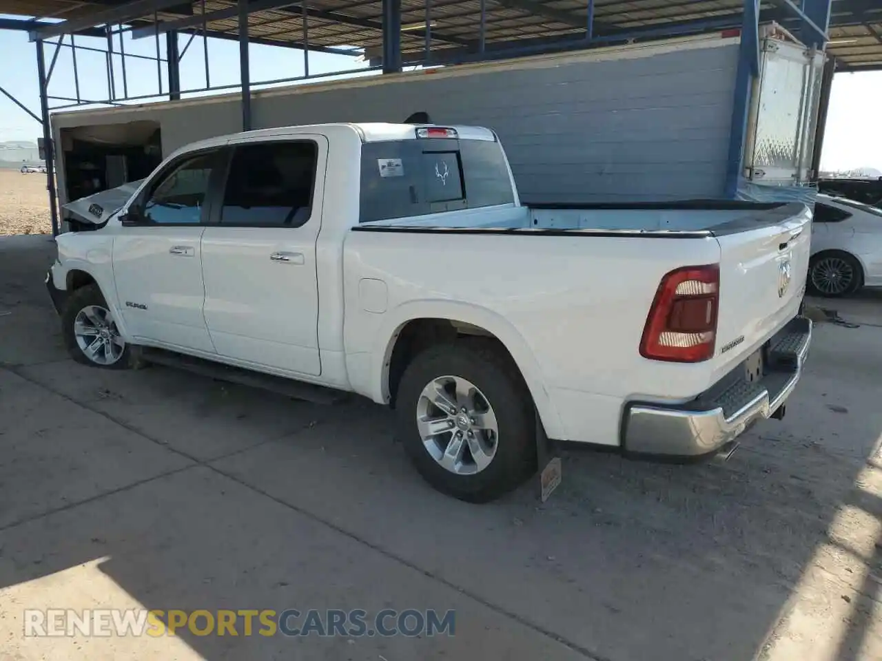 2 Photograph of a damaged car 1C6SRFJT4MN676963 RAM 1500 2021