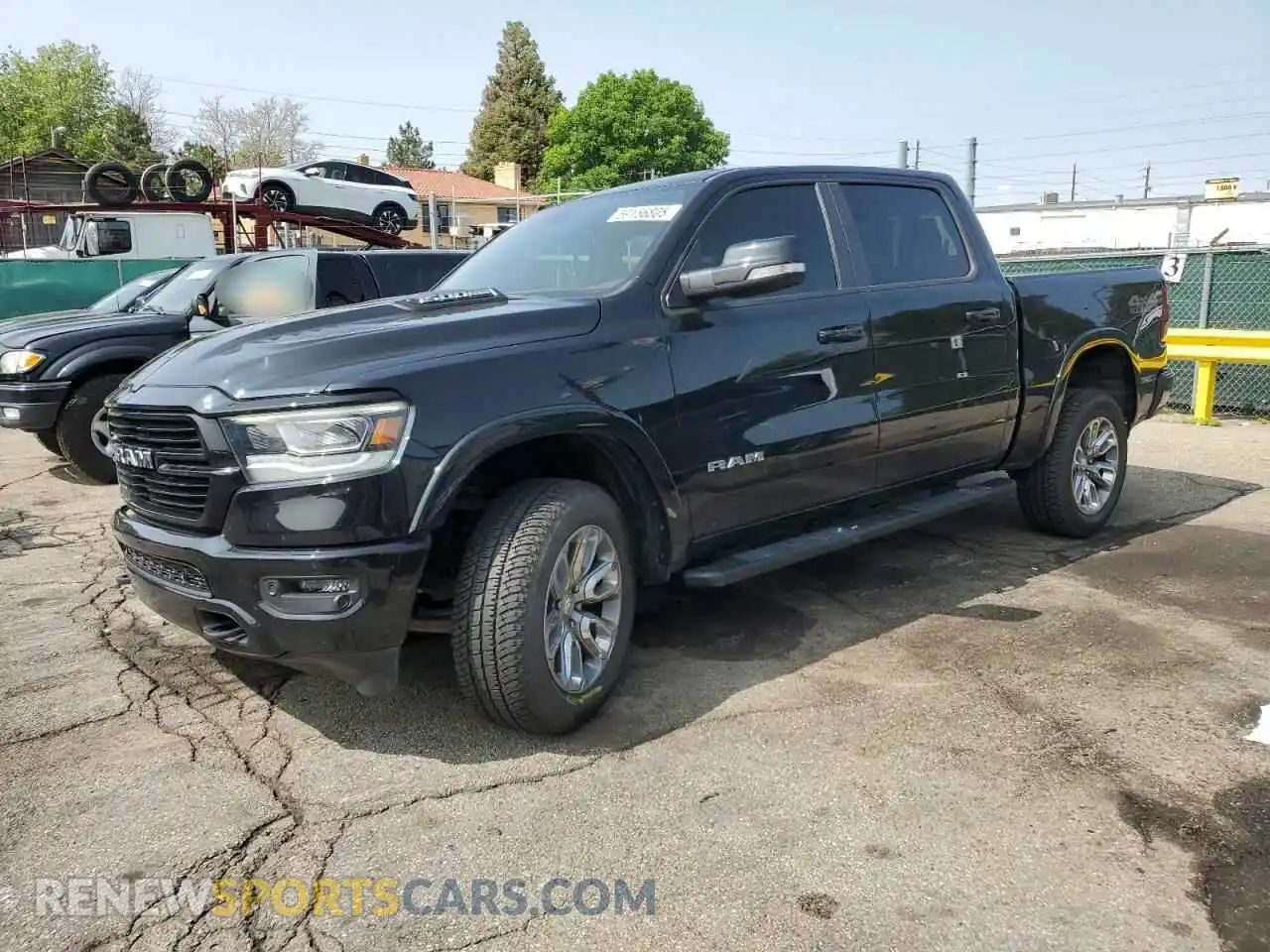 1 Photograph of a damaged car 1C6SRFJT4MN779235 RAM 1500 2021