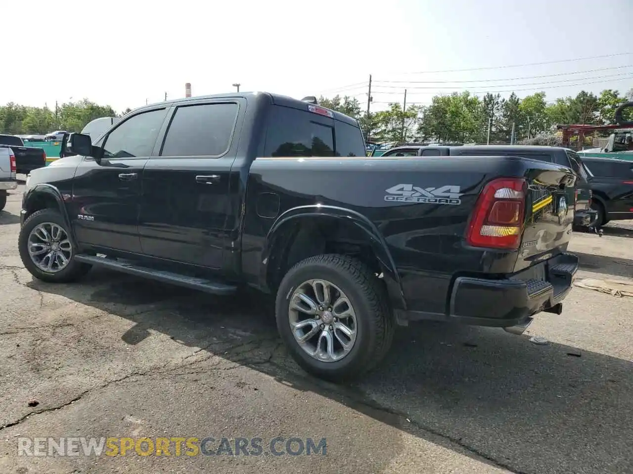 2 Photograph of a damaged car 1C6SRFJT4MN779235 RAM 1500 2021