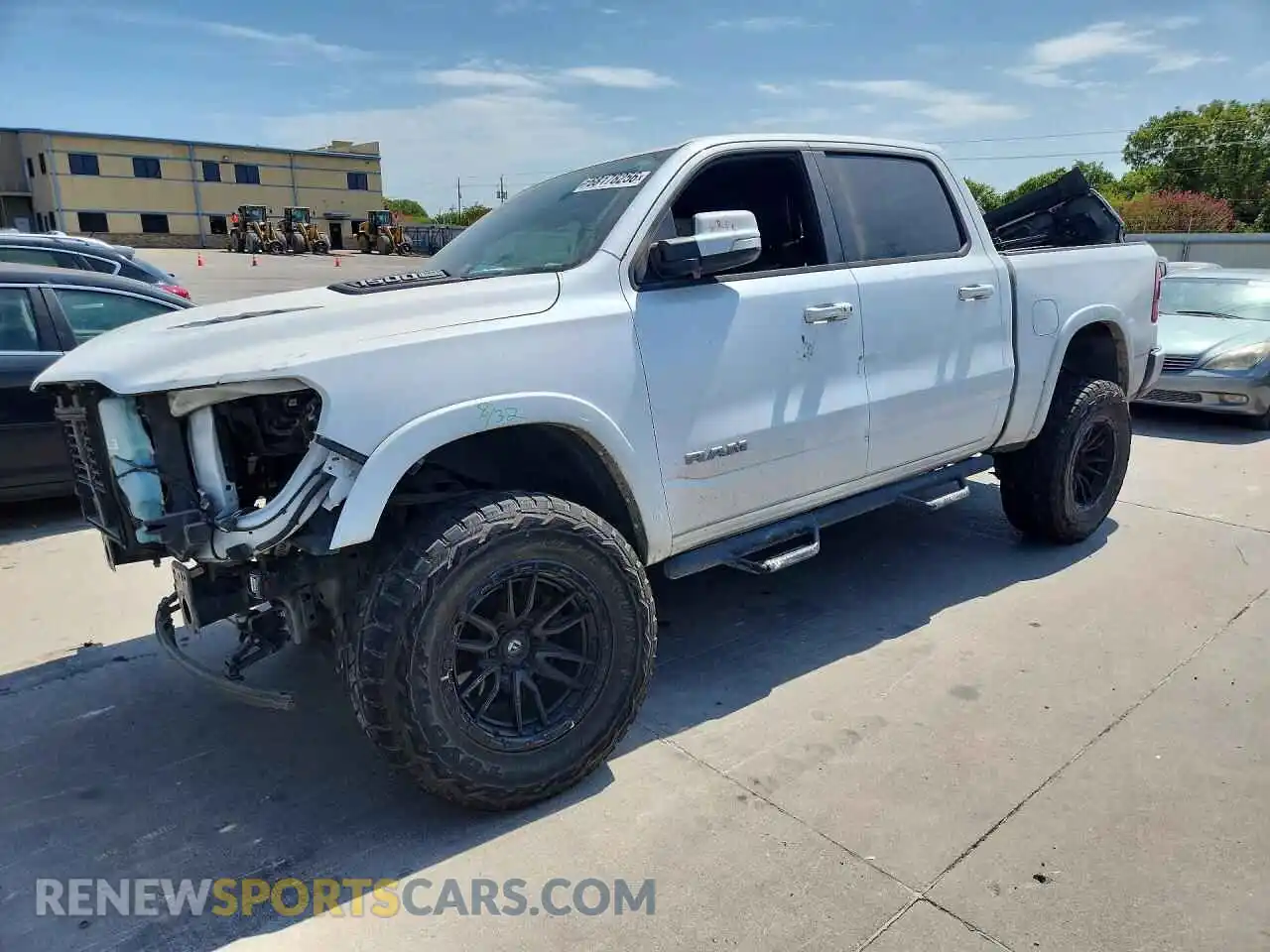 1 Photograph of a damaged car 1C6SRFJT4MN805414 RAM 1500 2021