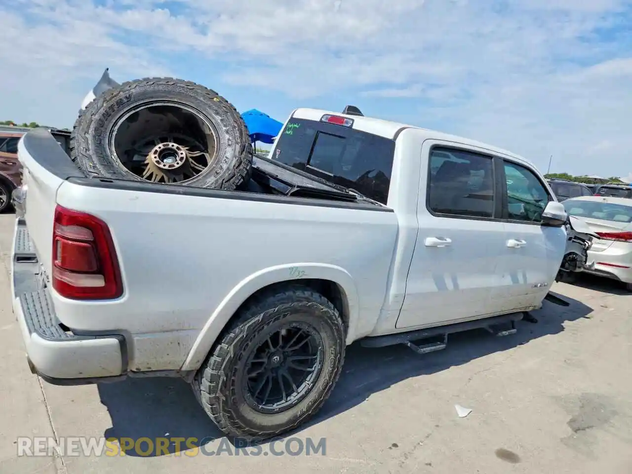 3 Photograph of a damaged car 1C6SRFJT4MN805414 RAM 1500 2021
