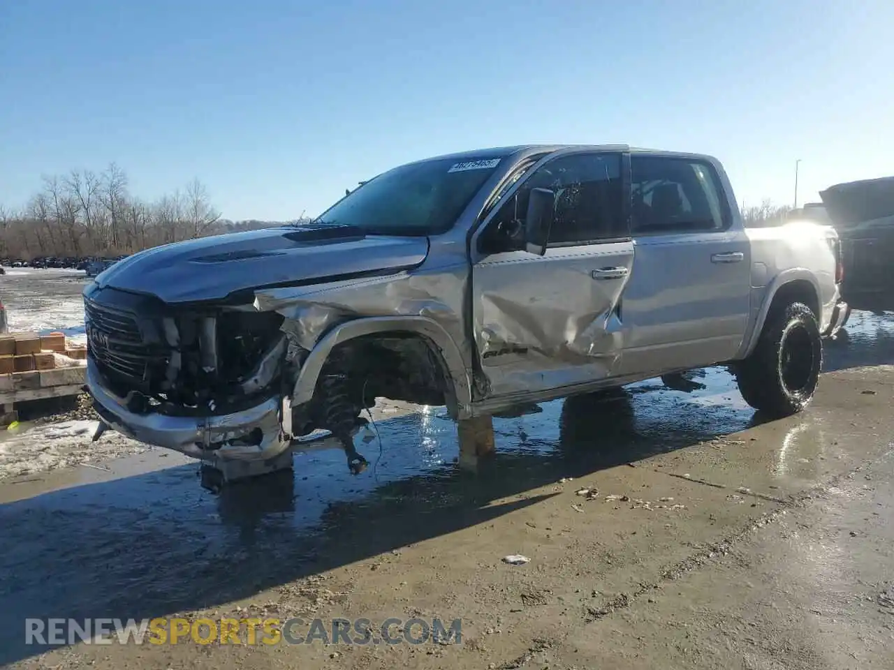1 Photograph of a damaged car 1C6SRFJT5MN610843 RAM 1500 2021