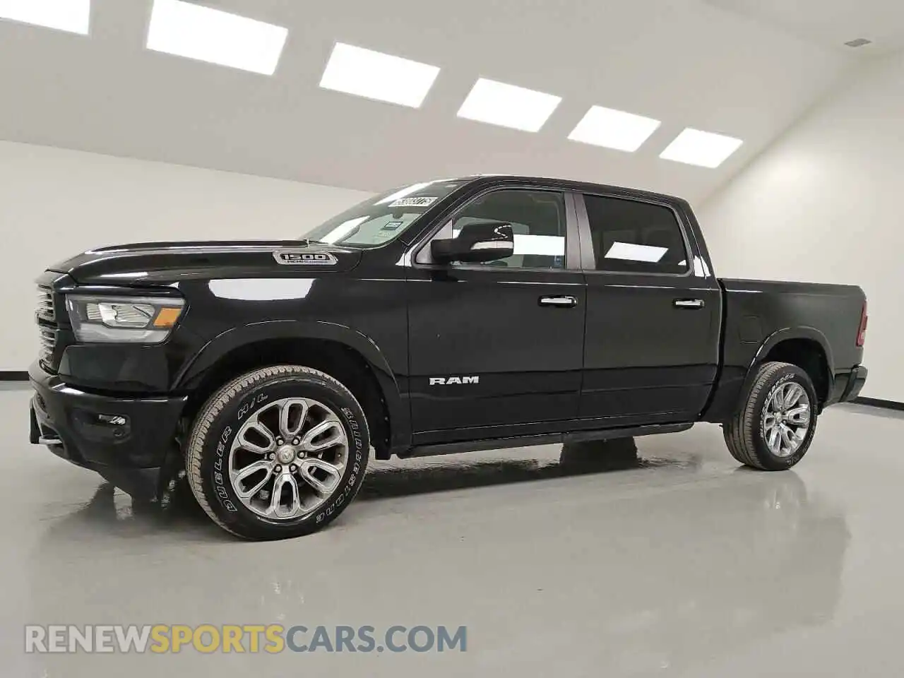1 Photograph of a damaged car 1C6SRFJT5MN682576 RAM 1500 2021
