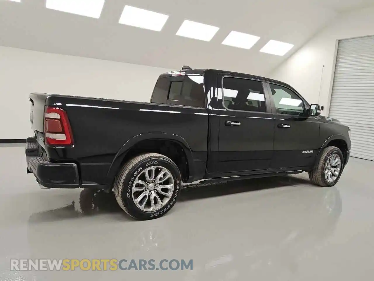 3 Photograph of a damaged car 1C6SRFJT5MN682576 RAM 1500 2021